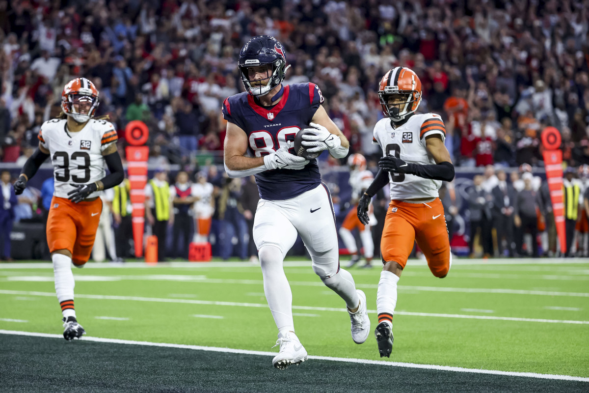 Jan 13, 2024; Houston, Texas, USA; Houston Texans tight end Dalton Schultz (86) scores a touch down during the second quarter in a 2024 AFC wild card game at NRG Stadium. Mandatory Credit: Troy Taormina-USA TODAY Sports